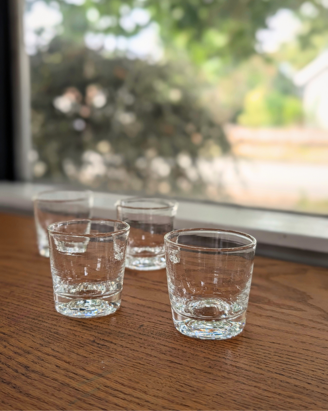 Handblown Sake Glass on wood