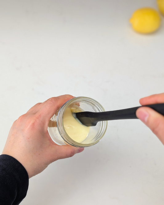 Resistant Silicone Spatula – Black in use with a jar